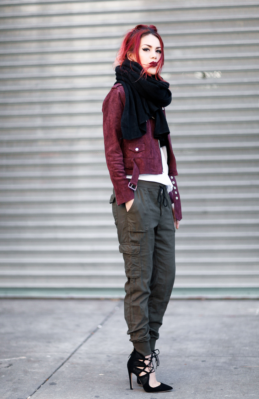 Le Happy wearing cargo pants and Obey Burgundy jacket