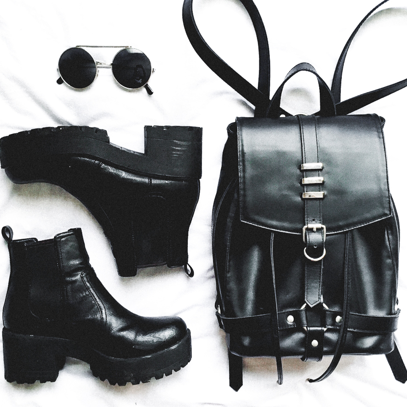 Black backpack and chunky boots