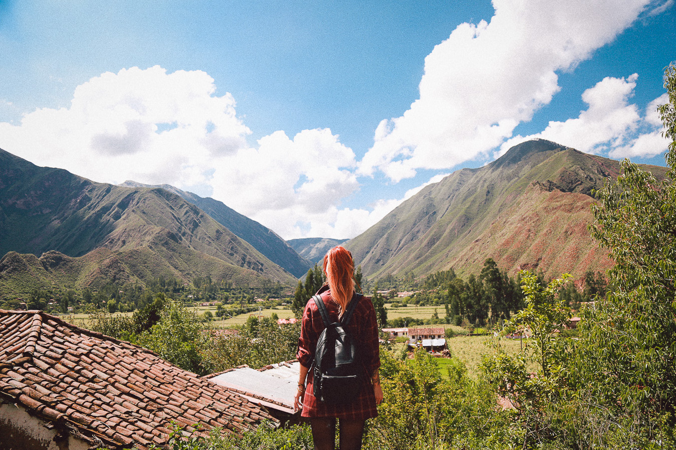 Le Happy wearing ASH leather backpack in Cusco in Peru