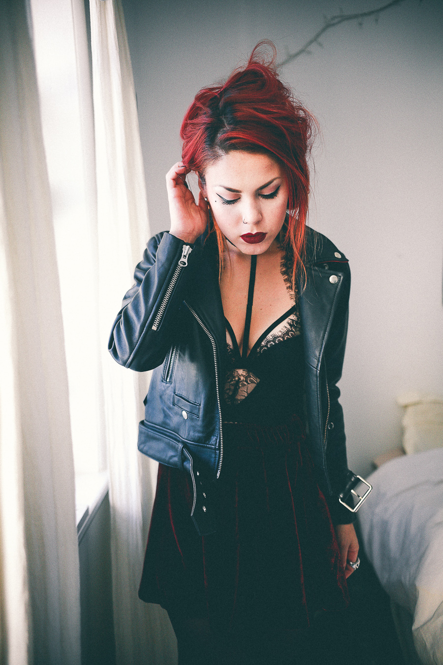 Le Happy wearing Nasty Gal biker jacket and lace corset