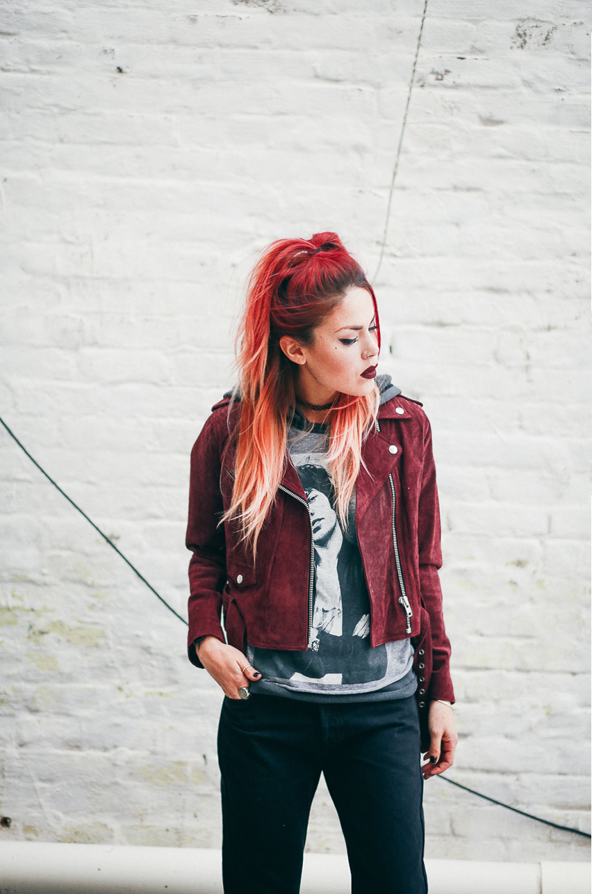 Le Happy wearing Obey burgundy jacket and Jim Morrison tee