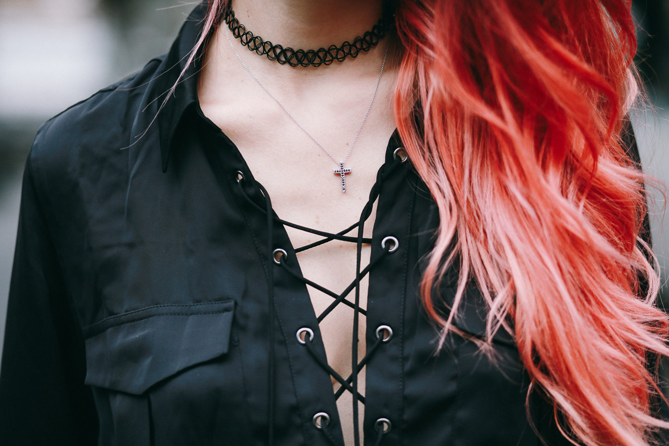 Le Happy wearing L'Academie blouse and diamond cross necklace