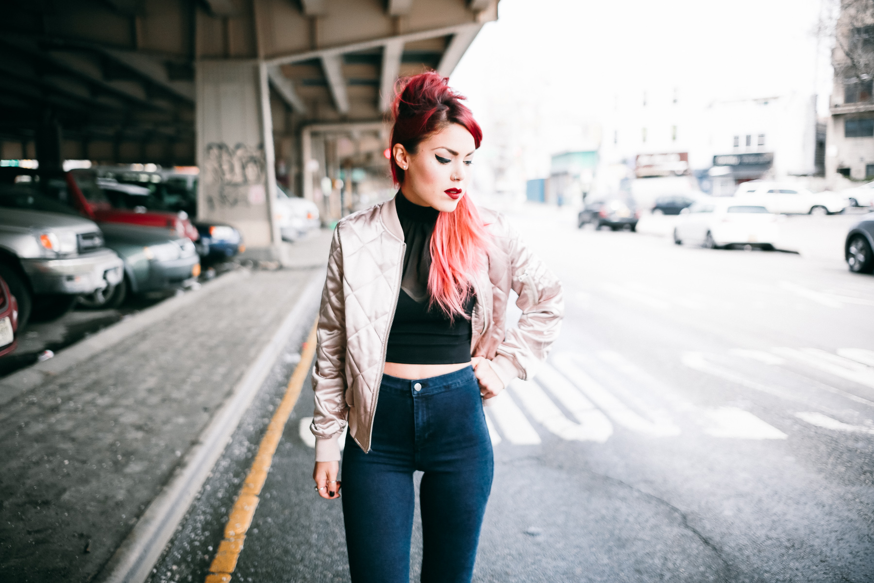 Le Happy wearing Topshop Joni jeans and satin bomber jacket