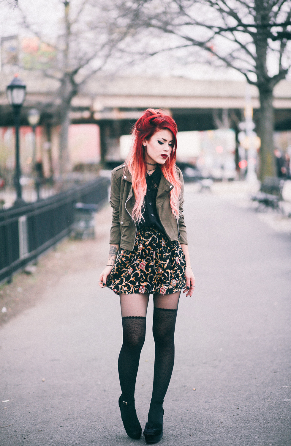 Lua wearing Missguided suede biker jacket and floral mini skirt