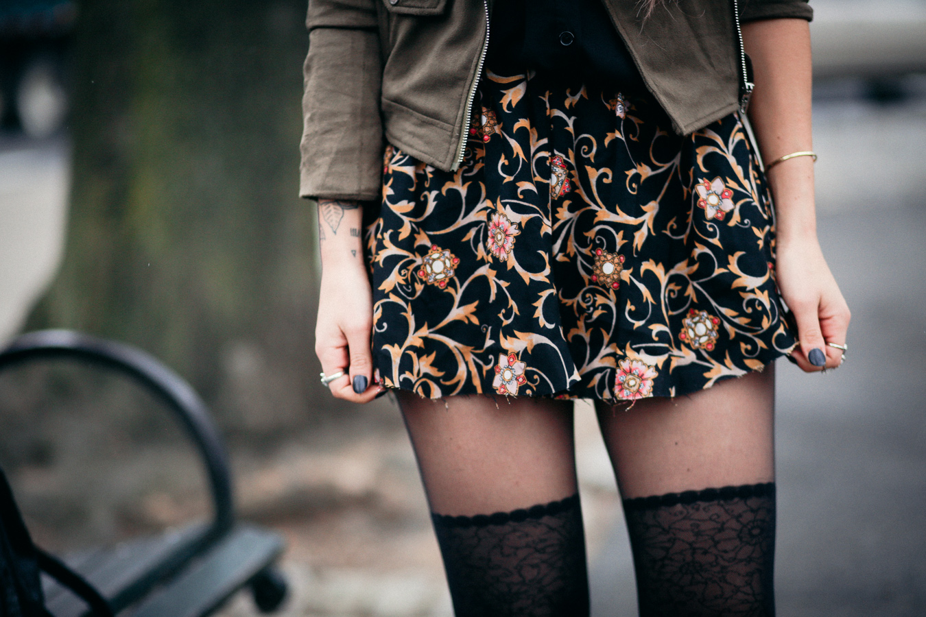 Le Happy wearing thigh high socks and floral mini skirt