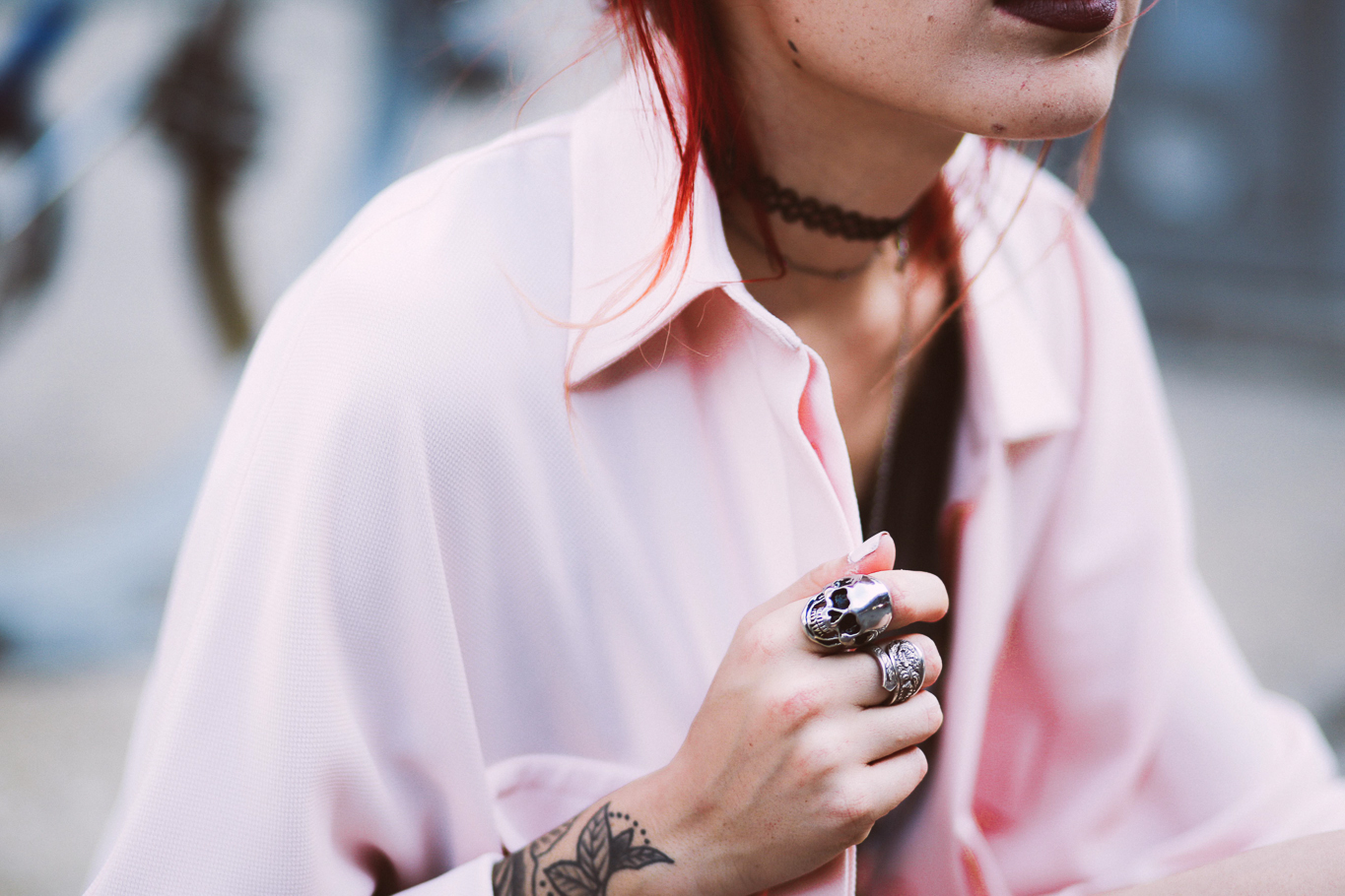 Le Happy wearing House of Need skull ring