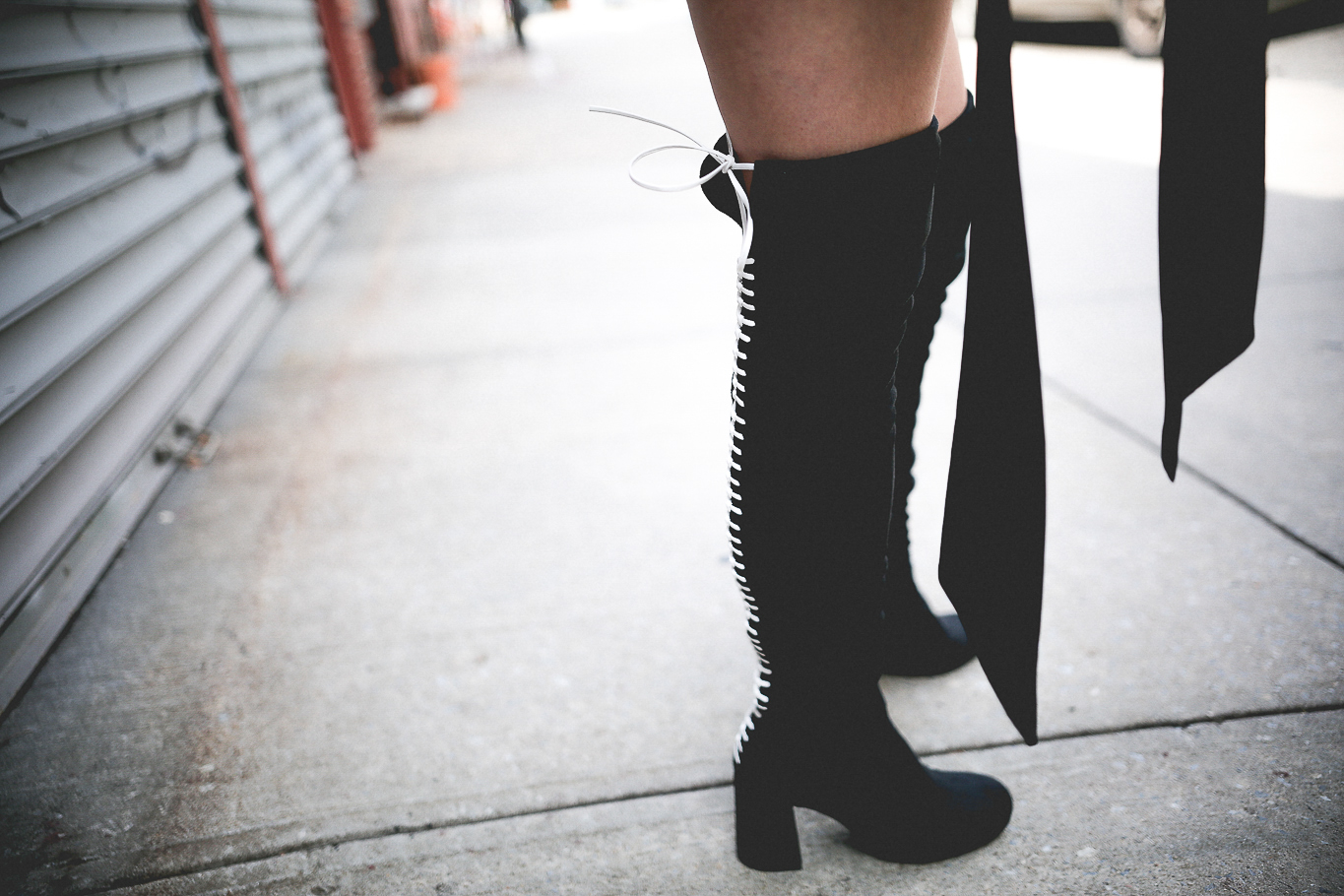 Le Happy wearing McQ thigh high boots 