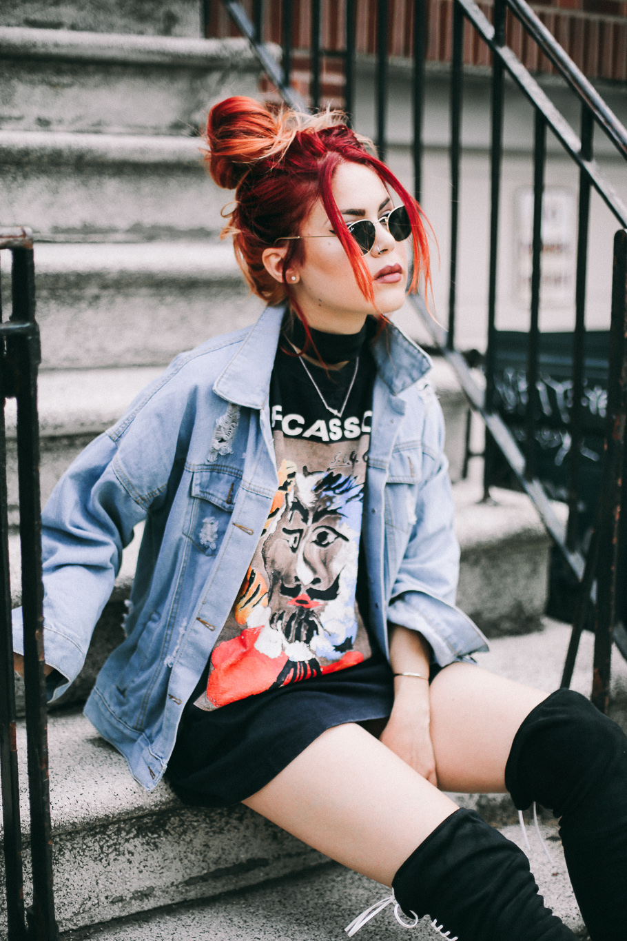 Le Happy wearing McQ thigh high boots and denim jacket