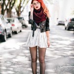 Le Happy wearing Joa striped skater dress and burgundy scarf with a biker jacket